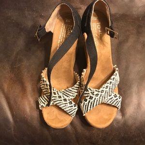 Tom’s Black and white strapped cork wedge